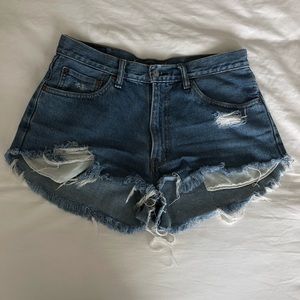 Levi 550 High Rise Distressed Cut Off Denim Shorts